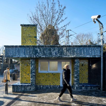 Assemble give Seven Sisters station tiled facade in tiles