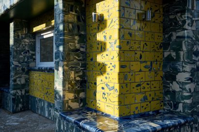 Assemble give Seven Sisters station tiled facade in tiles