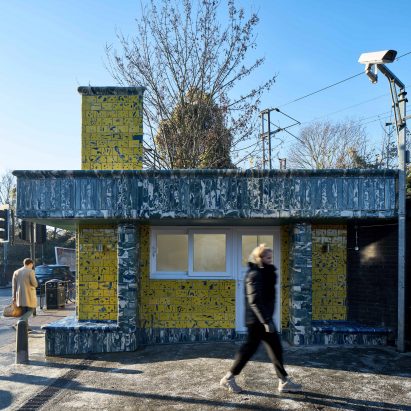Assemble give Seven Sisters station tiled facade in tiles