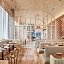 Wooden ceiling curves over restaurant in Austin by Michael Hsu