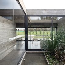 10 home interiors that make use of board-marked concrete