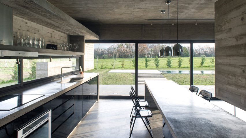 10 home interiors that make use of board-marked concrete