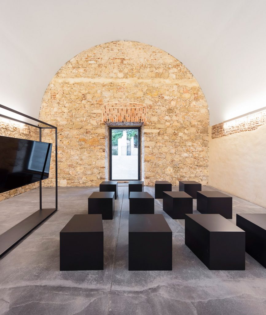 This restored church in Alenquer, central Portugal has been repurposed by Spaceworkers to include an arched exhibition space that commemorates the life and historical legacy of Portuguese philosopher and scholar Damião de Gois.