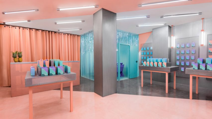 Masquespacio creates colour-clashing interior for phone-repair shop in Valencia