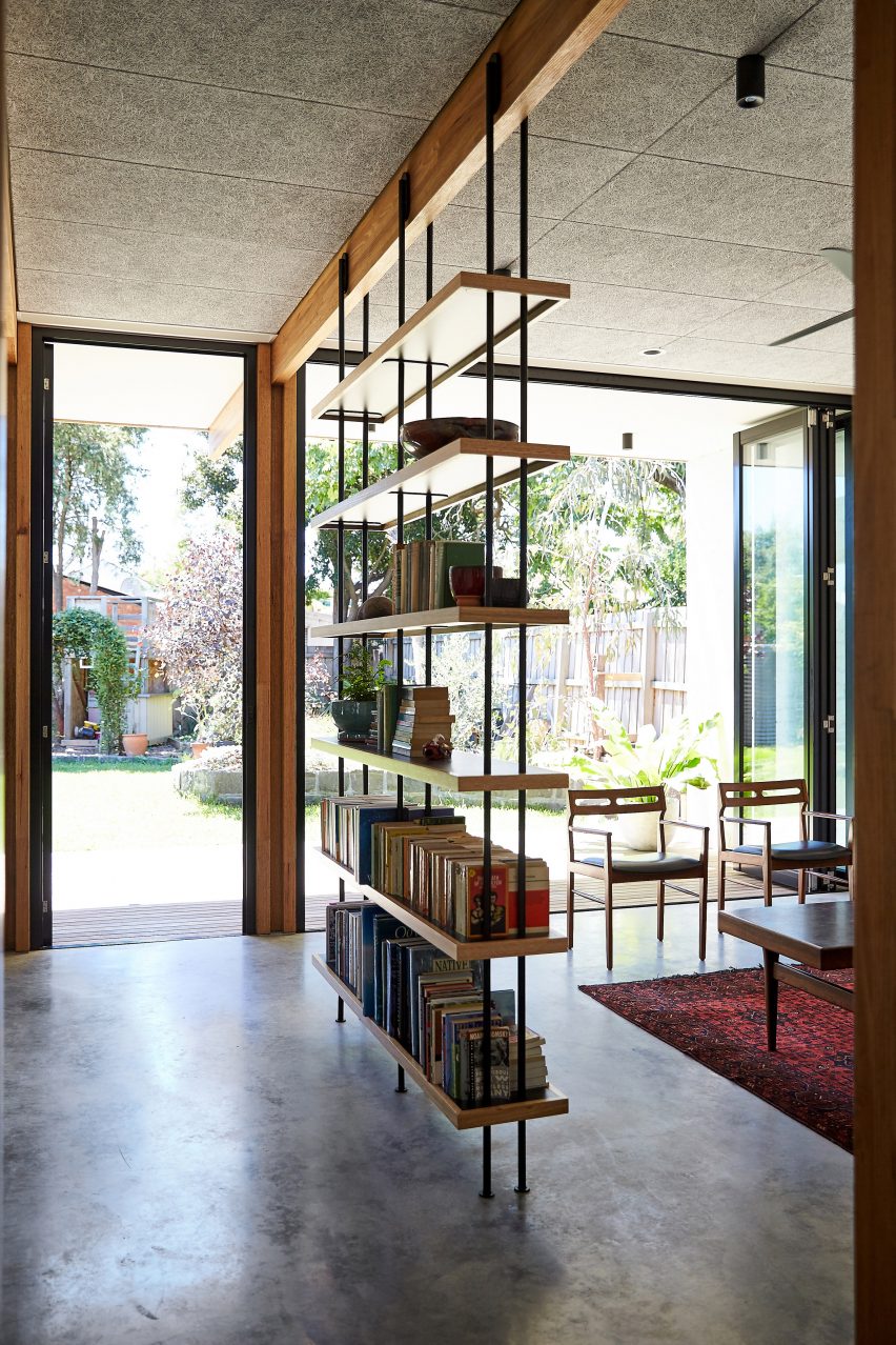 This single-storey house in Melbourne has been renovated by local studio Foomann to include exposed wooden beams that span the entirety of the property.