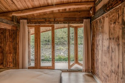Springingstream guesthouse's wavy tiled roof is based on the outline of surrounding mountains