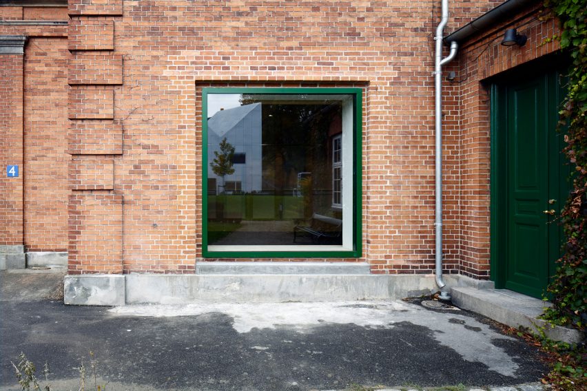 Leth & Gori converts Copenhagen chapel into cancer-care facility featuring colourful painted joinery