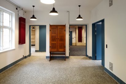 Leth & Gori converts Copenhagen chapel into cancer-care facility featuring colourful painted joinery