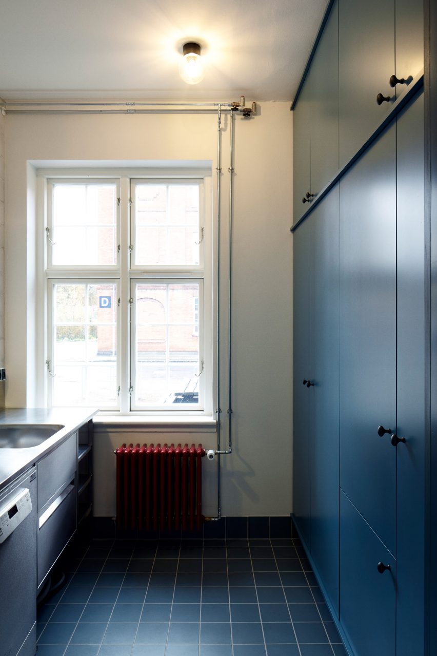 Leth & Gori converts Copenhagen chapel into cancer-care facility featuring colourful painted joinery