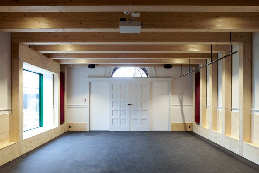Leth & Gori converts Copenhagen chapel into cancer-care facility featuring colourful painted joinery