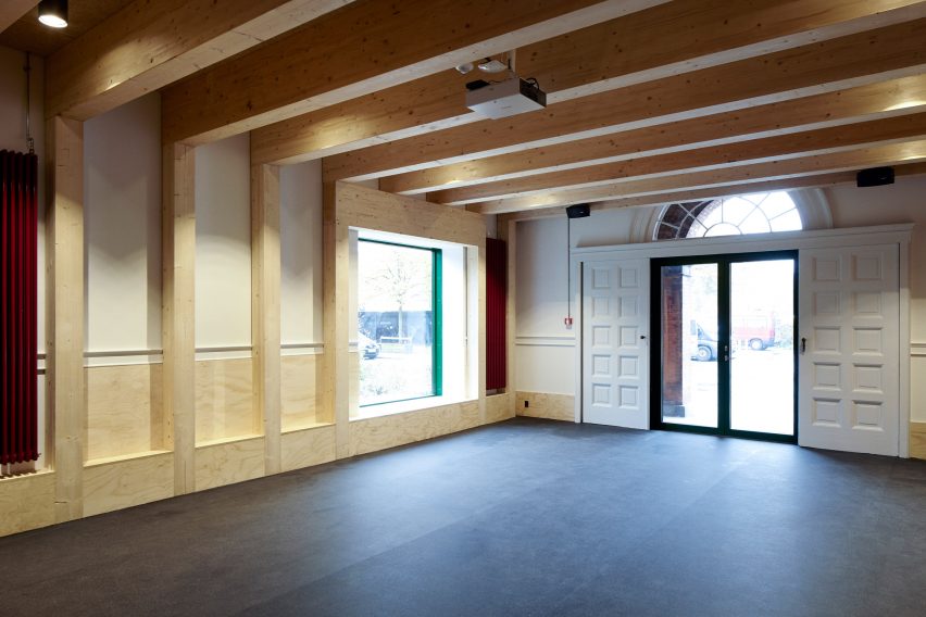 Leth & Gori converts Copenhagen chapel into cancer-care facility featuring colourful painted joinery