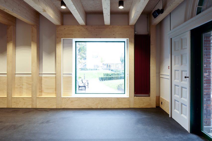 Leth & Gori converts Copenhagen chapel into cancer-care facility featuring colourful painted joinery