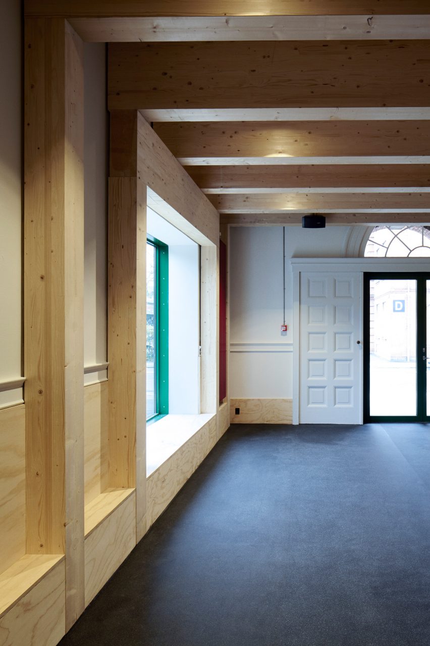 Leth & Gori converts Copenhagen chapel into cancer-care facility featuring colourful painted joinery