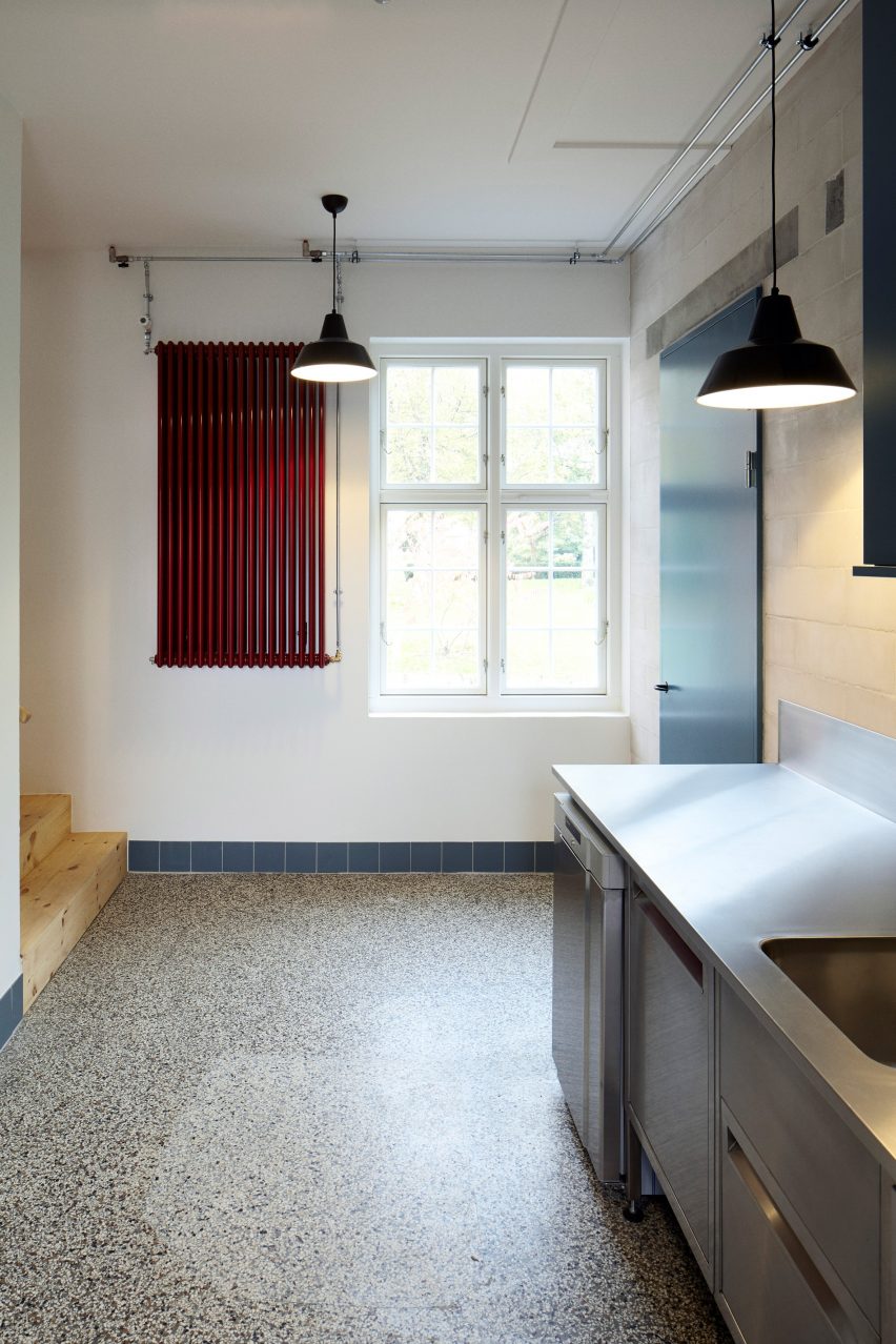 Leth & Gori converts Copenhagen chapel into cancer-care facility featuring colourful painted joinery