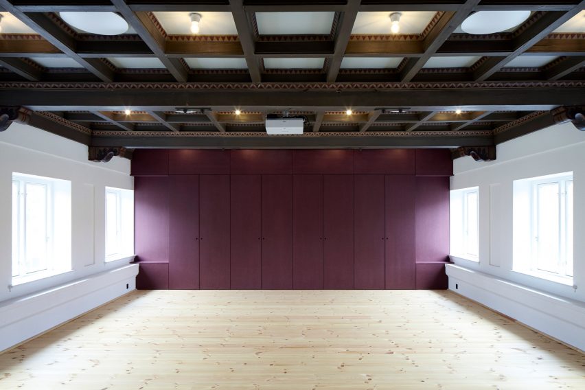 Leth & Gori converts Copenhagen chapel into cancer-care facility featuring colourful painted joinery