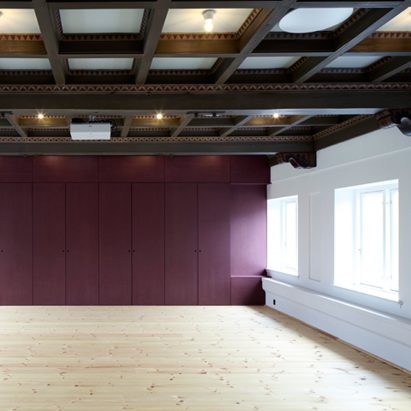 Leth & Gori converts Copenhagen chapel into cancer-care facility with colourful painted joinery