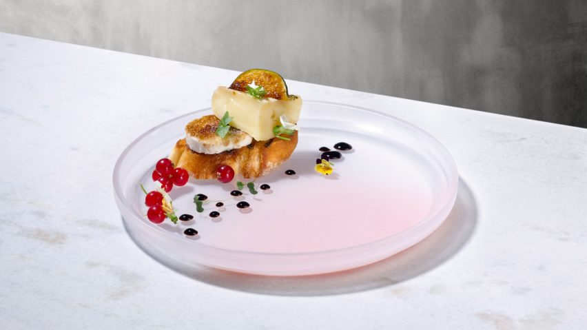 Nude has unveiled a new glassware collection, including a series of serving plates with accents of coloured pigment by Studio Formafantasma.