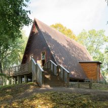 Triangular timber roof shelters the ruins of Sweden’s oldest church
