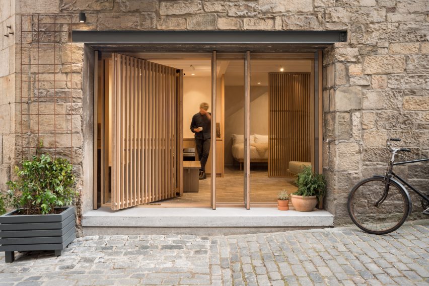 Old Edinburgh workshop transformed into minimal holiday retreat by Izat Arundell