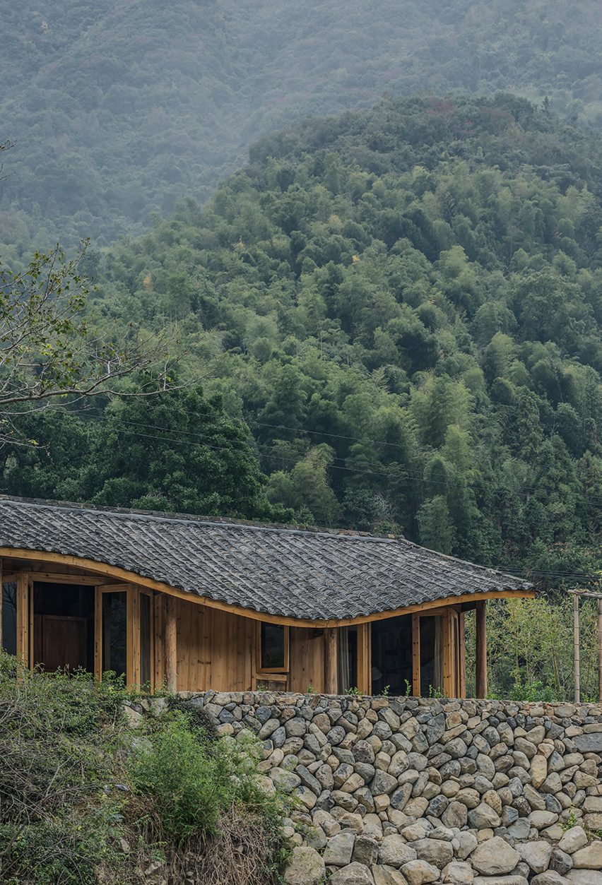 Springingstream guesthouse's wavy tiled roof is based on the outline of surrounding mountains