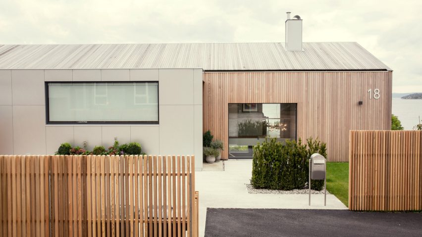 Skapa updates prefabricated Norwegian seafront house with glazed walls