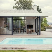 Skapa updates prefabricated Norwegian seafront house with glazed walls