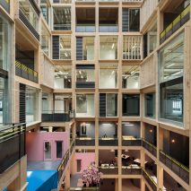 Drone footage reveals 10-storey timber atrium by Studio RHE