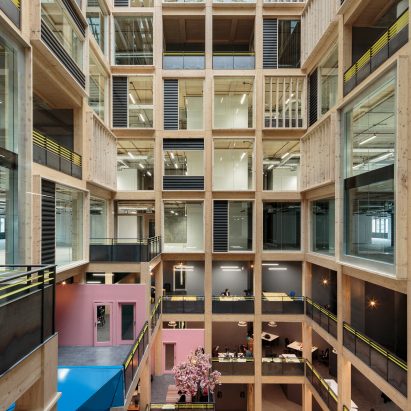 Drone footage reveals 10-storey timber atrium by Studio RHE