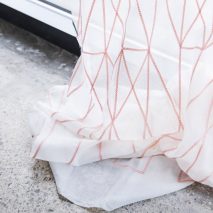 Bouroullecs embroider geometric patterns onto translucent Kvadrat fabric