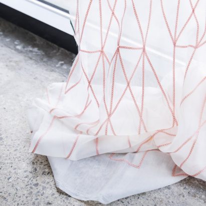 Bouroullecs embroider geometric patterns onto translucent Kvadrat fabric