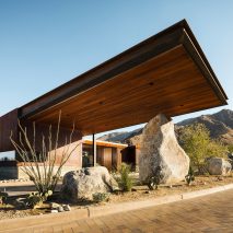 Cantilevered roof extends from Palm Springs guardhouse by Studio AR+D