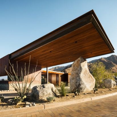 Cantilevered roof extends from Palm Springs guardhouse by Studio AR+D