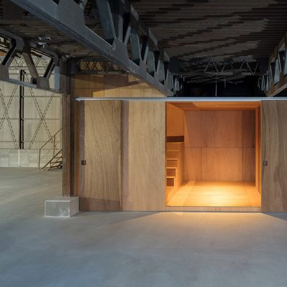 Schemata Architects adds sequence of plywood boxes to redefine spaces inside House in Nobeoka