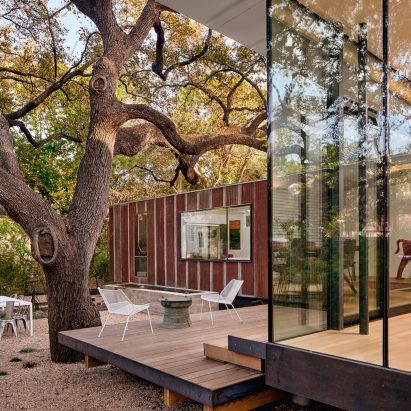 Nick Deaver enlarges 1930s cottage in Austin with glass and metal additions