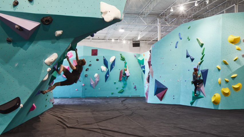 Faceted structures and colourful holds form climbing walls in Minneapolis bouldering gym
