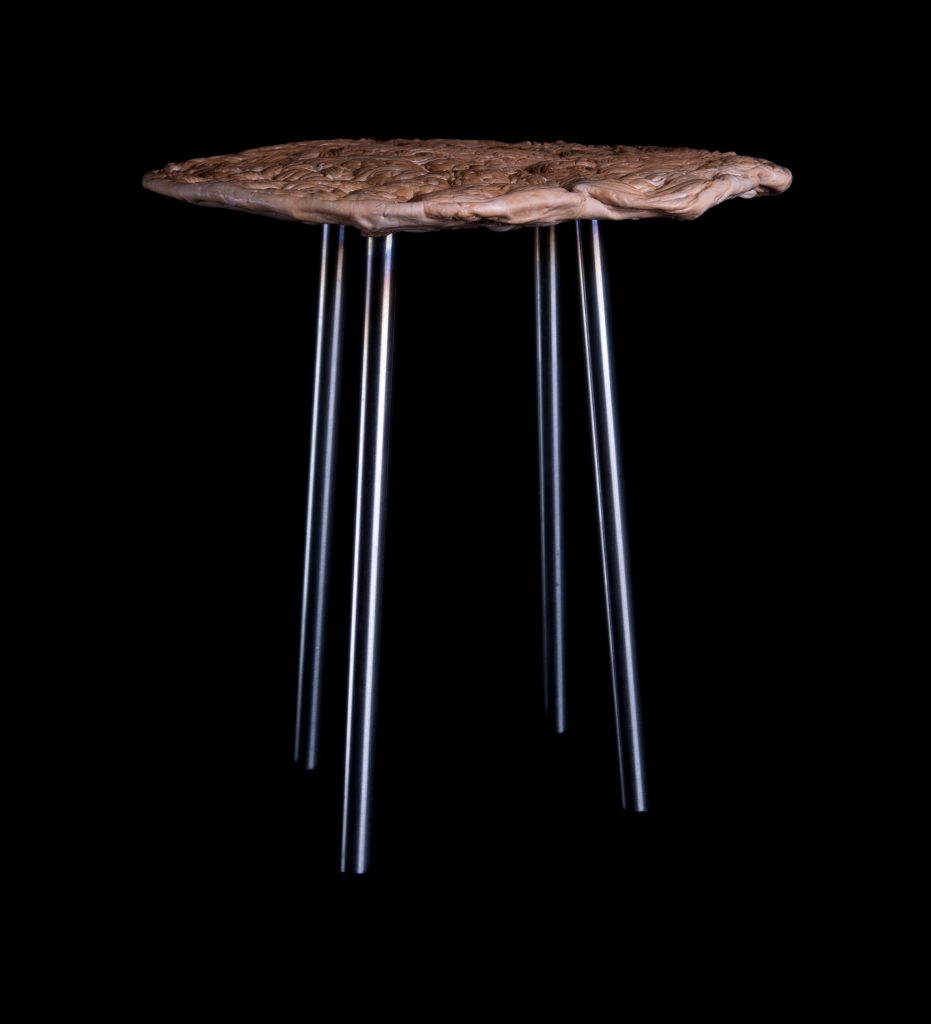 A group of four German designers have turned the oddly-shaped plates of raw plastic that pour out of injection moulding machines during production, into stool seats.