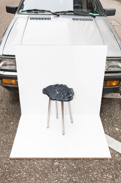 A group of four German designers have turned the oddly-shaped plates of raw plastic that pour out of injection-moulding machines during production, into stool seats.
