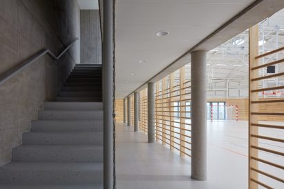 The sports hall designed by local architecture office Sporadical adjoins a recently modernised and extended primary school in the town of Dolní Břežany