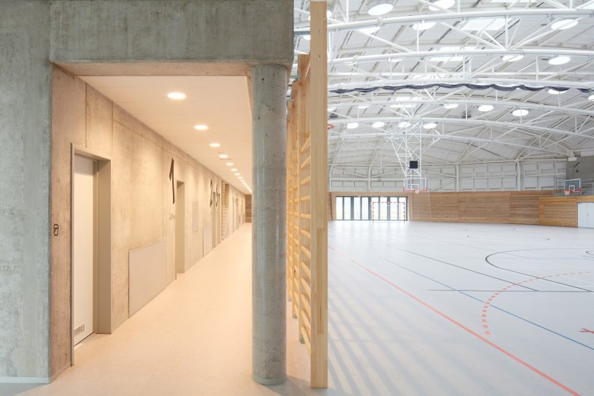 The sports hall designed by local architecture office Sporadical adjoins a recently modernised and extended primary school in the town of Dolní Břežany