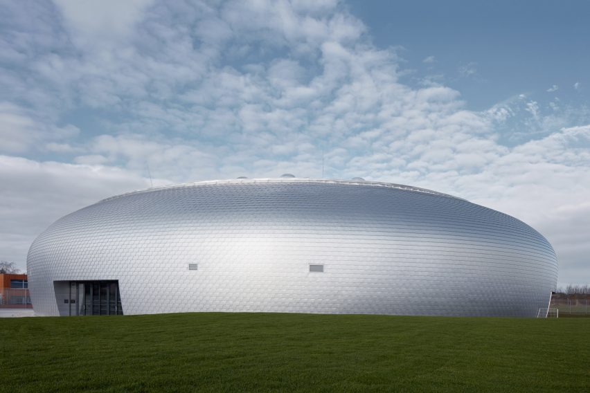 The sports hall designed by local architecture office Sporadical adjoins a recently modernised and extended primary school in the town of Dolní Břežany