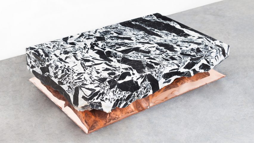 Ben Storms creates Inhale tables from metal cushions and marble slabs