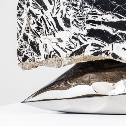 Ben Storms creates Inhale tables from metal cushions and marble slabs