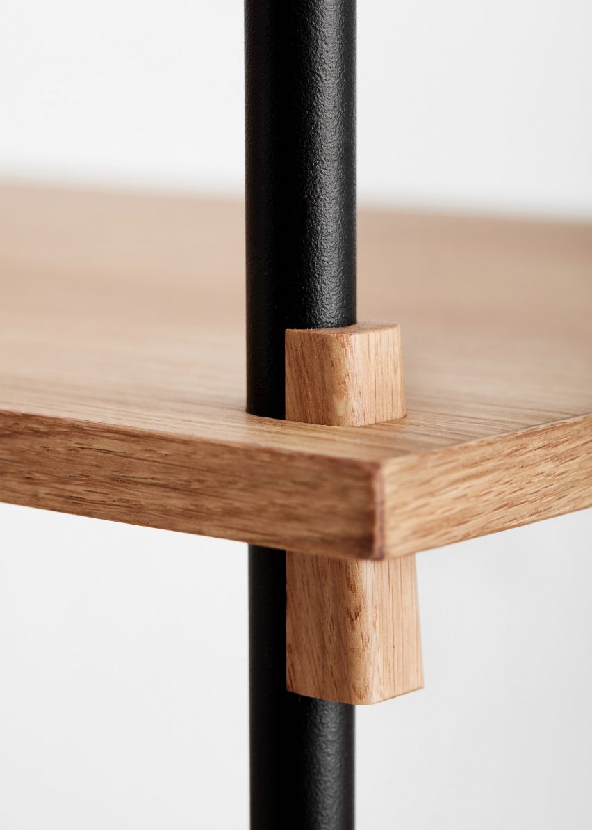 Moebe creates flexible shelving system that is held together by wooden wedges