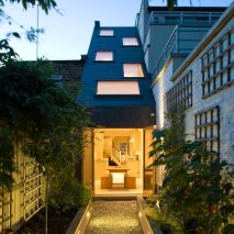 Slim House has large sloped roof to increase natural light