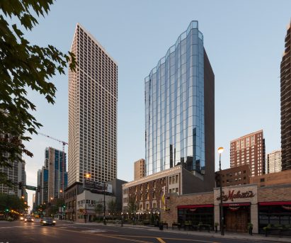 An outside photograph of the glass tower of Viceroy Chicago designed by Goettsch Partners