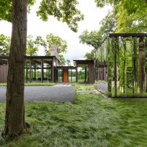 Altus designs Minnesota home and accompanying “shiny shed” to blend with the forest