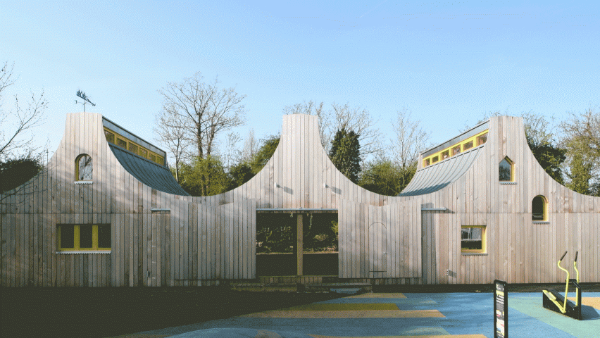 Sliding doors connect school building by Studio Weave to playground and woods