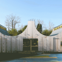 Sliding doors connect school building by Studio Weave to playground and woods