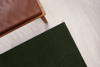 British designer Ilse Crawford was inspired by the natural landscape surrounding the Kasthall factory in Kinna, Västergötland when creating her collection of green rugs for the Swedish textile company.