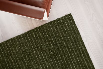 British designer Ilse Crawford was inspired by the natural landscape surrounding the Kasthall factory in Kinna, Västergötland when creating her collection of green rugs for the Swedish textile company.